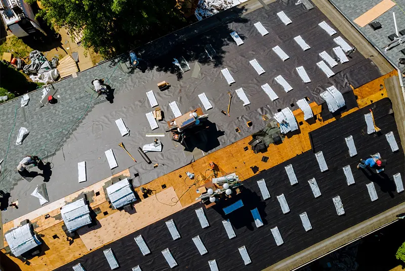 A commercial roof installation in progress, showcasing Sunstate Roofs' expertise as a Central Florida roofing company and contractor specializing in commercial roofing for new business developments.