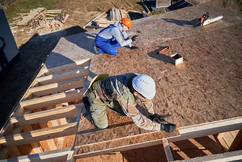 Roofing contractors from a Central Florida roofing company working on a residential roof repair, showcasing expert craftsmanship and reliable residential roofing solutions for homeowners