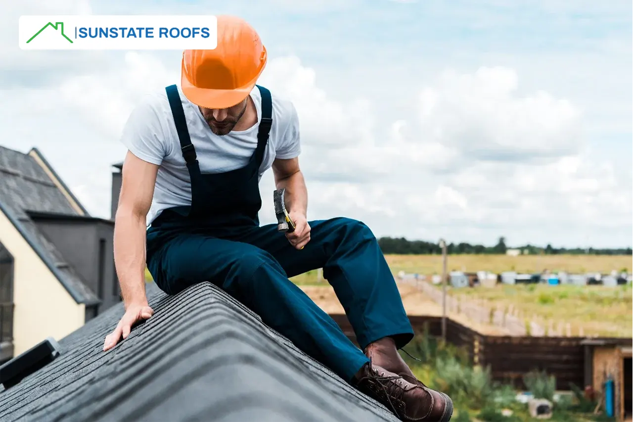 A roofing professional sitting on a roof in Central Florida, showcasing the benefits of UV-resistant roof coatings. The image highlights roof waterproofing and waterproofing solutions, including waterproofing membranes and products, ideal for flat roofs and concrete roofs. Perfect for roofing and waterproofing applications in Florida’s climate. 