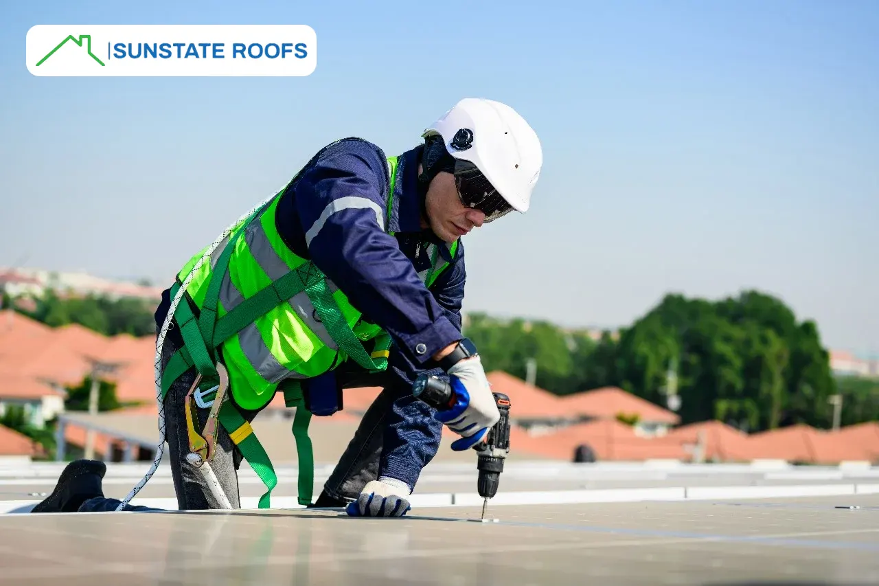 Worker in safety gear using tools on a roof, representing Sunstate Roofs in Winter Park, FL, offering flexible financing options with Acorn Finance for roof repair and replacement. Keywords include financing with Acorn, Acorn Finance offers, finance your roof, and flexible financing