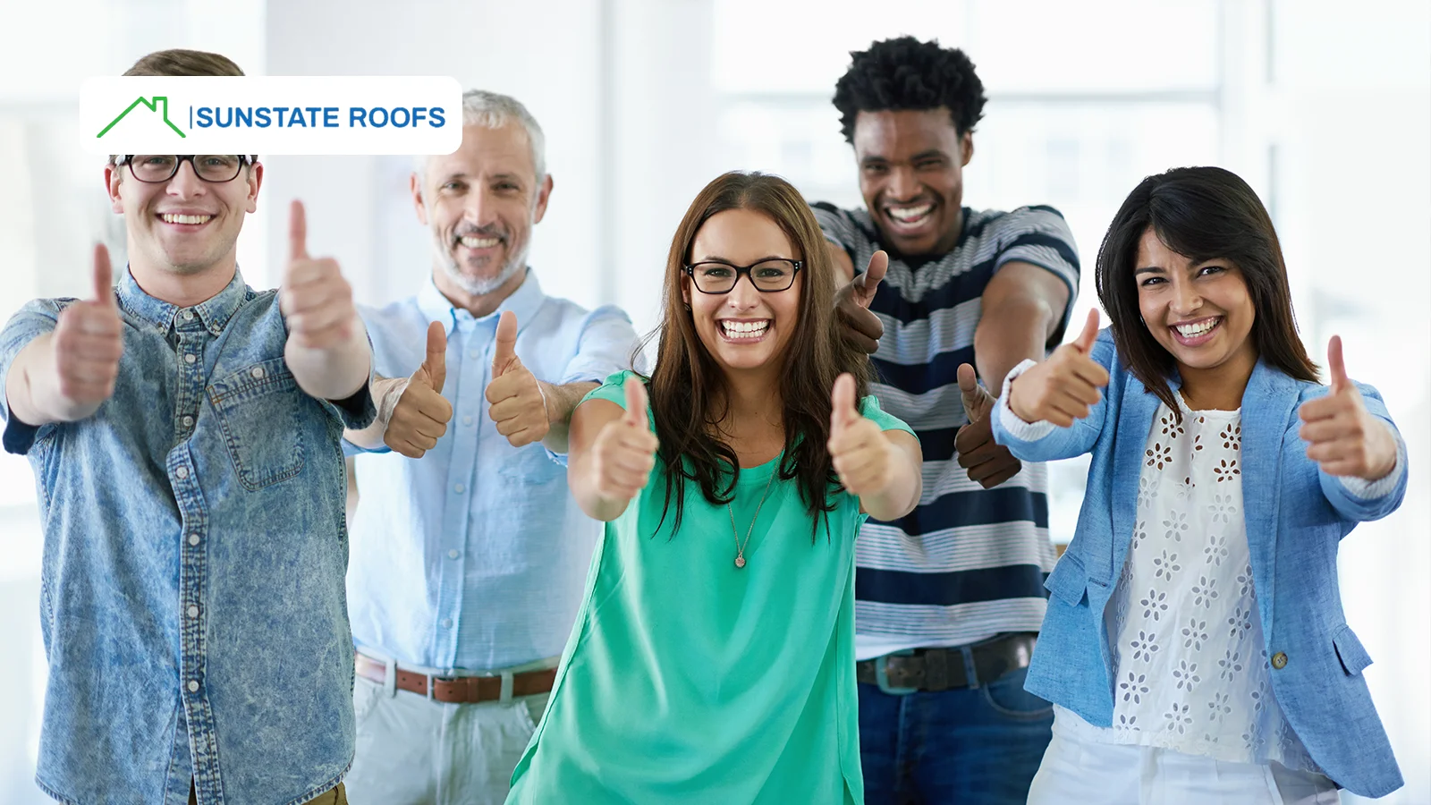 Satisfied homeowners giving thumbs-up after a successful emergency roof repair project by Sunstate Roofs.