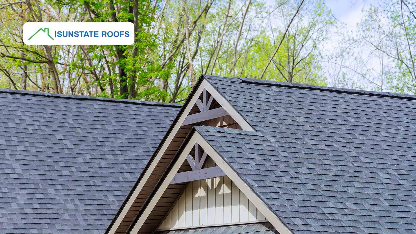 A close-up of a stylish asphalt shingle roof on a suburban home, emphasizing the durability and weather resistance of residential roofing.