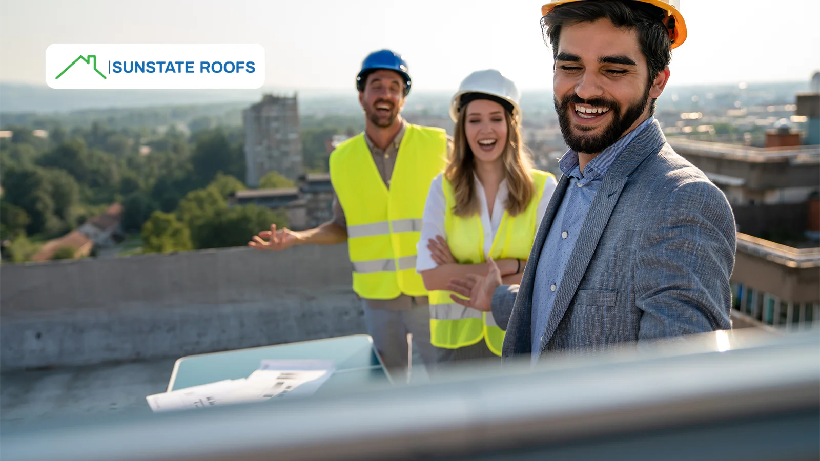 Construction professionals inspecting a residential roof, ensuring quality control and precision in residential roofing installations.