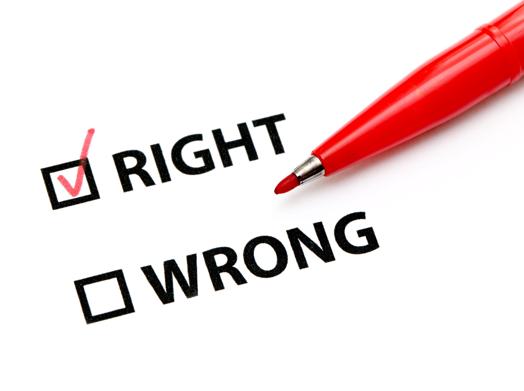 A piece of paper with the words 'Right' and 'Wrong' written on it, symbolizing the importance of making informed decisions. Choosing professional Roofing Services in Central Florida ensures the right choice for quality roof installation and repairs.