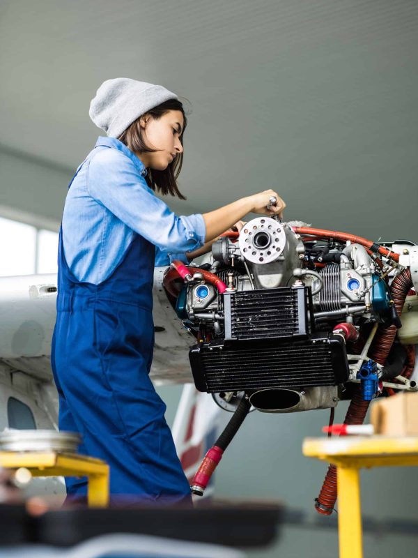 Dana Cotton, a skilled engineer and part of Sunstate Roofs’ professional team, working on equipment. Sunstate Roofs, a Central Florida roofing company and roofing contractor, specializes in residential and commercial roofing solutions with expert precision